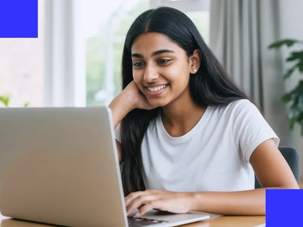 Girl doing math at laptop